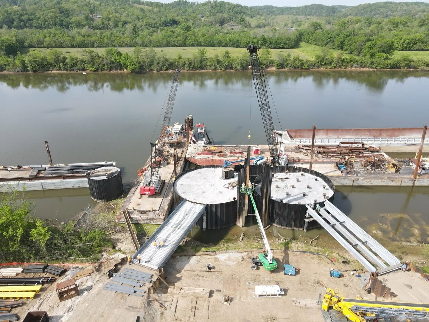 Commercial marine construction at the Ashland City River Port featuring reinforced concrete dock structures and bridge access