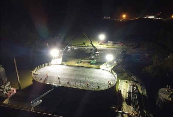 Nighttime concrete placement under temporary lighting for the new commercial barge dock in Ashland City, TN